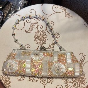 Elegant Beaded Clutch with Floral Design